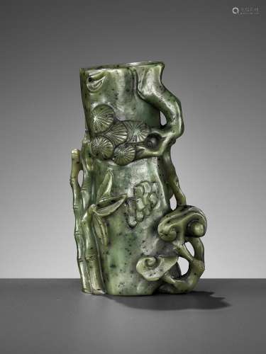A SPINACH GREEN JADE 'PINE, LINGZHI AND BAMBOO' VASE, 18TH C...