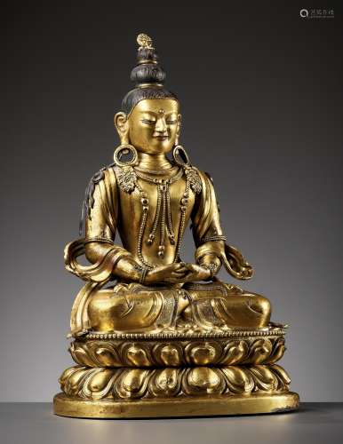 A CAST AND REPOUSSE GILT COPPER ALLOY FIGURE OF AMITAYUS, QI...