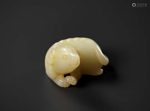 A YELLOW JADE FIGURE OF A DOG, QING DYNASTY