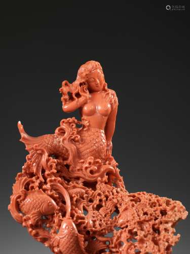 A FINELY CARVED CORAL GROUP OF A MERMAID AND FISH, 20TH CENT...