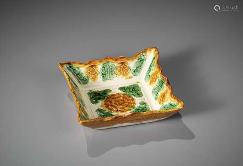 A SANCAI-GLAZED 'CHRYSANTHEMUM' SQUARE DISH, LIAO DYNASTY