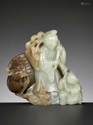 A CELADON AND BROWN JADE 'HE XIANGU, BOY AND PHOENIX' GROUP,...