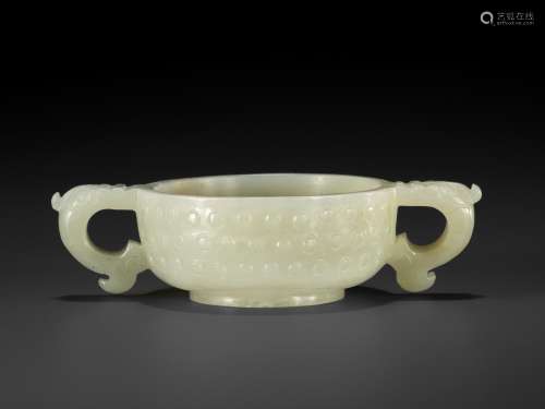 A PALE CELADON TWO-HANDLED JADE CUP, MING DYNASTY