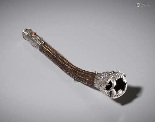 A SILVER AND STAG ANTLER 'MAKARA' FLUTE, KANGLING, TIBET, 19...