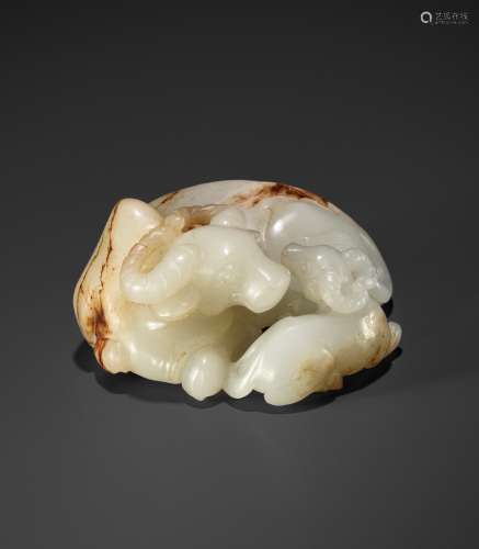 A WHITE AND RUSSET JADE GROUP OF A WATER BUFFALO AND A CALF,...