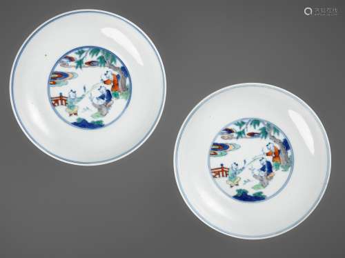 A MAGNIFICENT PAIR OF DOUCAI 'BOYS' DISHES, YONGZHENG MARKS ...