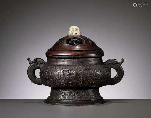 A BRONZE CENSER, GUI, WITH A WOOD COVER AND A JADE FINIAL, Y...