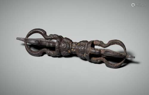 A GOLD AND SILVER DAMASCENED IRON VAJRA, TIBET, 12TH CENTURY