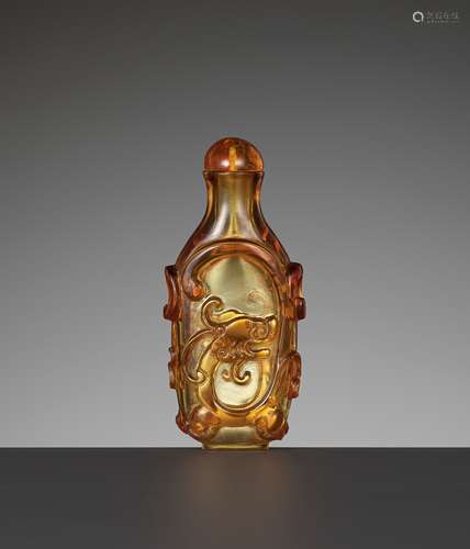 AN AMBER GLASS 'CHILONG' SNUFF BOTTLE, 1750-1850