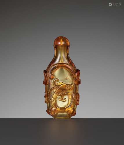 AN AMBER GLASS 'CHILONG' SNUFF BOTTLE, 1750-1850