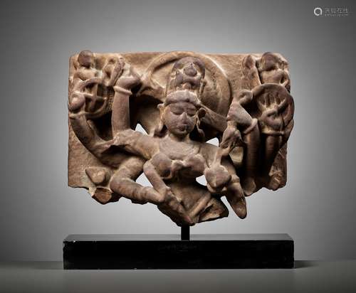 A SANDSTONE FRAGMENT OF DURGA SLAYING MAHISHA, UTTAR PRADESH