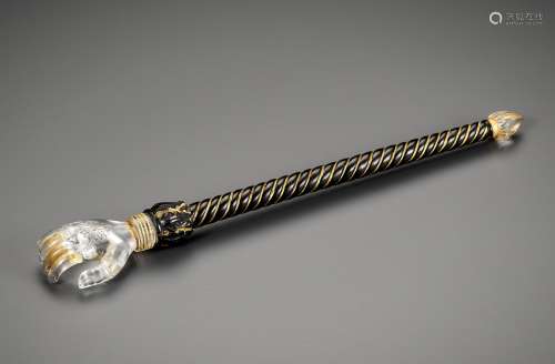 A FINELY CARVED ROCK CRYSTAL AND ONYX BACK SCRATCHER