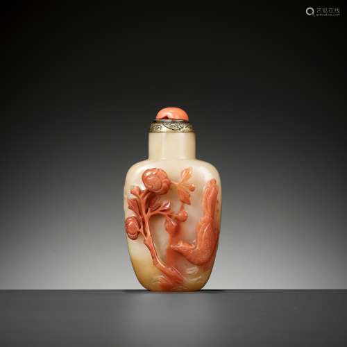 A CARNELIAN AGATE 'PHEASANT AND PEONY' SNUFF BOTTLE, OFFICIA...