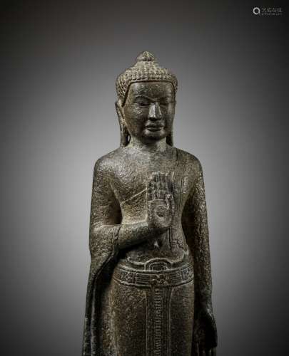 A SANDSTONE FIGURE OF STANDING BUDDHA