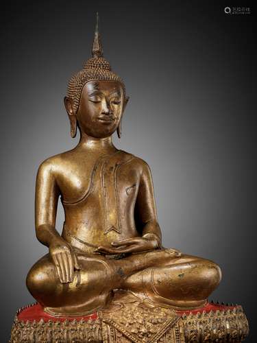 A LARGE LACQUER-GILT BRONZE FIGURE OF BUDDHA SHAKYAMUNI, RAT...