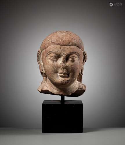 A PINK SANDSTONE HEAD OF BUDDHA, MATHURA, KUSHAN PERIOD