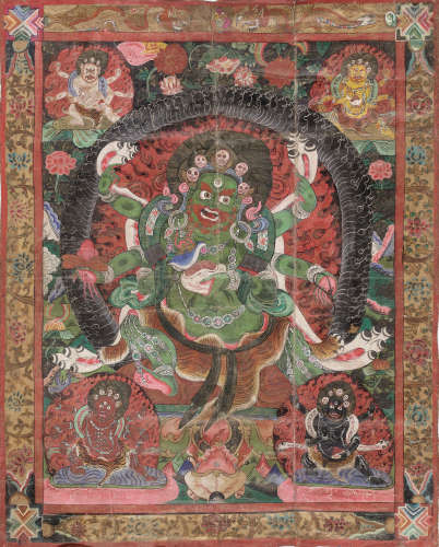 A RARE AND LARGE THANGKA DEPICTING THE GREEN MAHAKALA, TIBET...