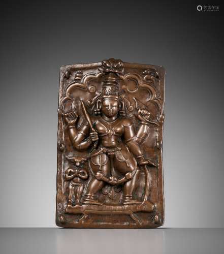 A CEREMONIAL COPPER SHIELD DEPICTING VIRABHADRA, 17TH-18TH C...