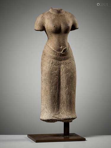 A SUBLIME SANDSTONE TORSO OF UMA, ANGKOR PERIOD, BAPHUON STY...