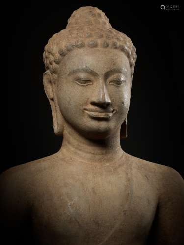 A MONUMENTAL AND HIGHLY IMPORTANT SANDSTONE FIGURE OF BUDDHA...