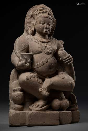 A RARE BACCHANALIAN KUBERA, GUPTA EMPIRE, PINK SANDSTONE