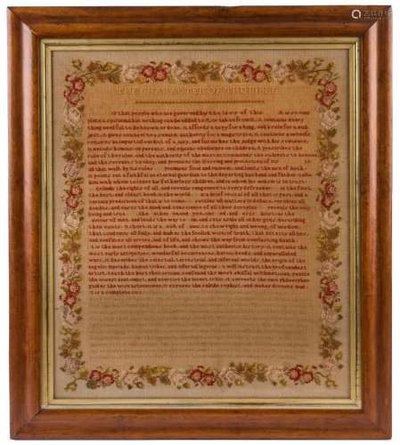 An antique English needlework sampler in original maple fram...