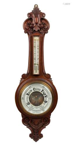 An antique English banjo barometer in walnut case, dial mark...