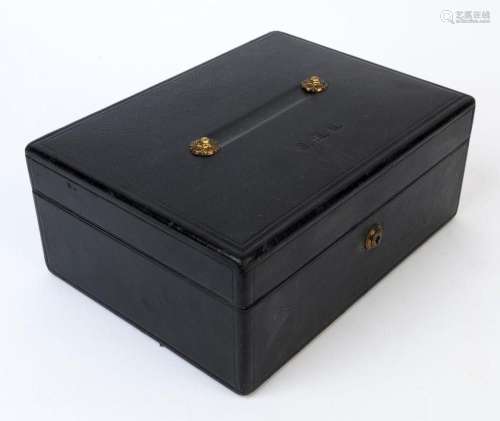 An antique English leather bound travel box by Leughars &...