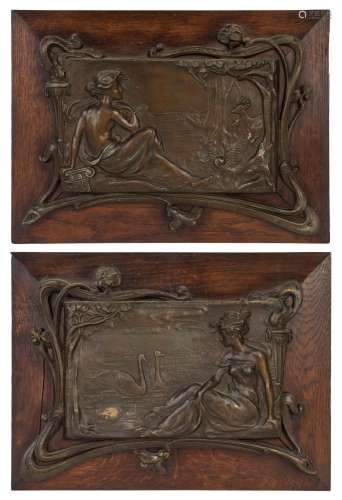 A pair of French Art Nouveau spelter wall plaques mounted on...