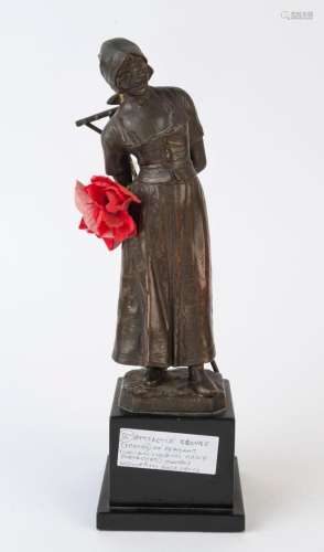 A French antique bronze and black slate statue of a peasant ...