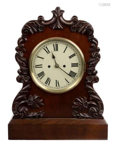 An antique English spring table clock in mahogany case with ...