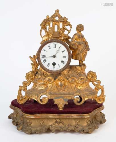 An antique French figural gilt metal clock, timepiece only w...
