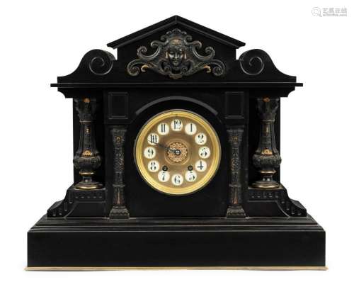 An antique French mantel clock in Belgian black slate case w...