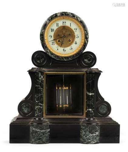 An antique French mantel clock in black slate and green marb...