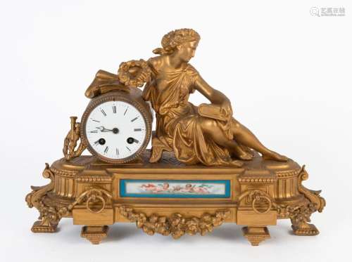 A French antique gilt metal figural mantel clock with time a...