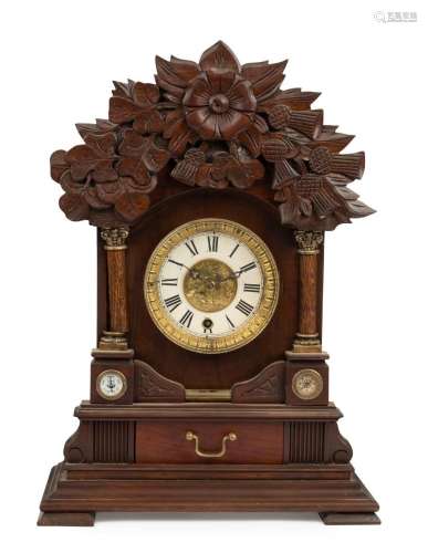 An antique weather station clock with carved timber case, En...
