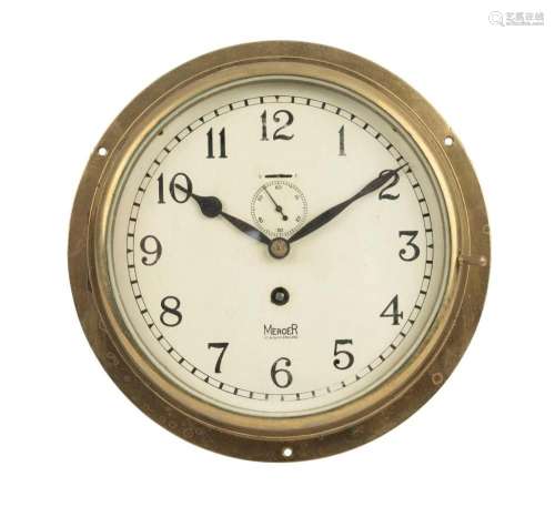 MERCER English porthole clock in wall mounted circular brass...