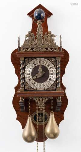 A Dutch antique style wall clock with twin weight driven mov...
