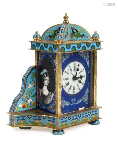 An ornate enamel and brass cased table clock with Roman nume...