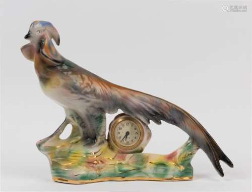 A German porcelain pheasant cased clock, 20th century, dial ...