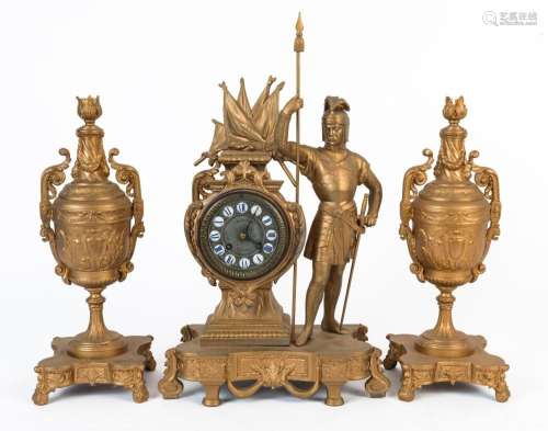 An antique French three piece figural clock set in ornate gi...