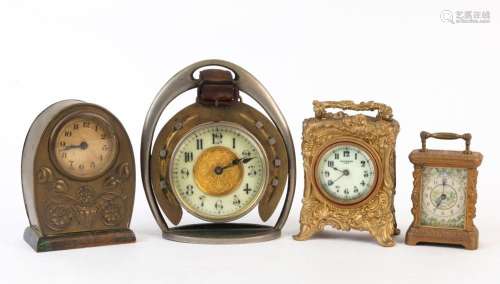 Four assorted American table clocks in metal cases, 19th/20t...