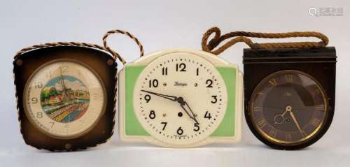 Three assorted vintage wall clocks, 20th century, the porcel...