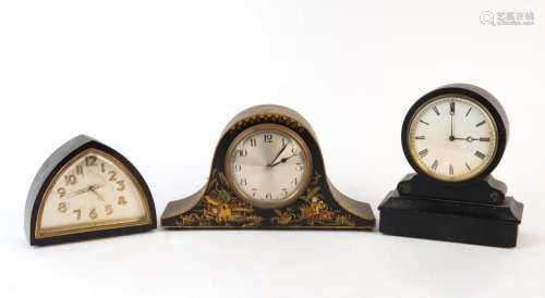 Three antique and vintage table clocks in black cases, 19th ...