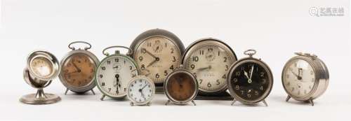 Nine assorted vintage and antique alarm clocks 19th and 20th...