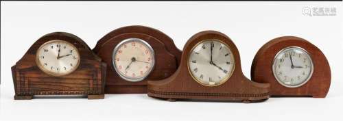 Four assorted timber cased clocks, 20th century, the largest...