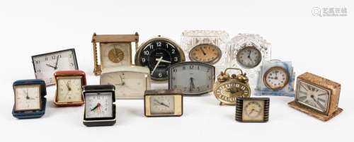 Thirteen assorted vintage table and bedside clocks including...