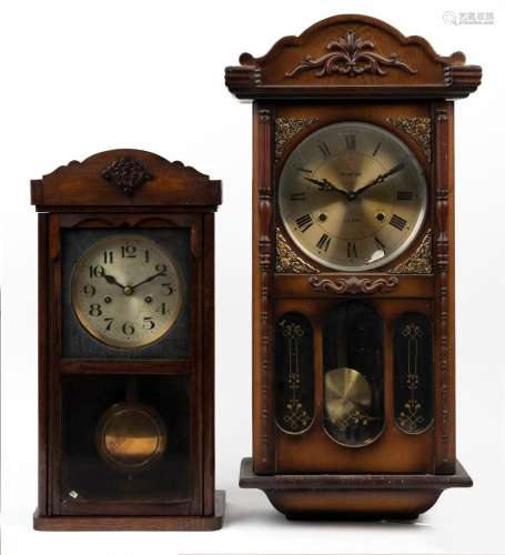 Two vintage timber cased wall clocks, 20th century, the larg...