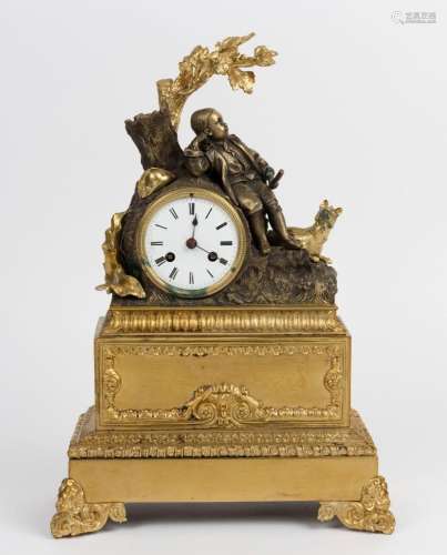 An antique French mantel clock with gilt metal figural case,...