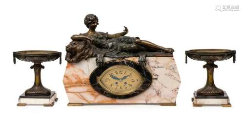 A French Art Deco mantel clock set in marble case with recli...